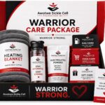 Open Warrior Care Package box containing a heating blanket, electrolytes powder, food card, gas card, gift card, and an encouraging note card resting on the edge of the box.